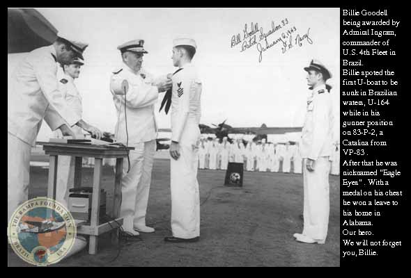 Goodel receiving a medal from Adm Ingram